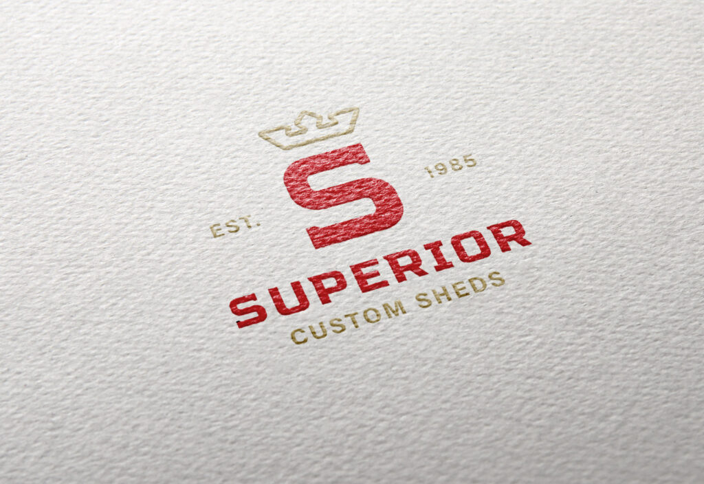 Superior Barns logo design embossed on paper