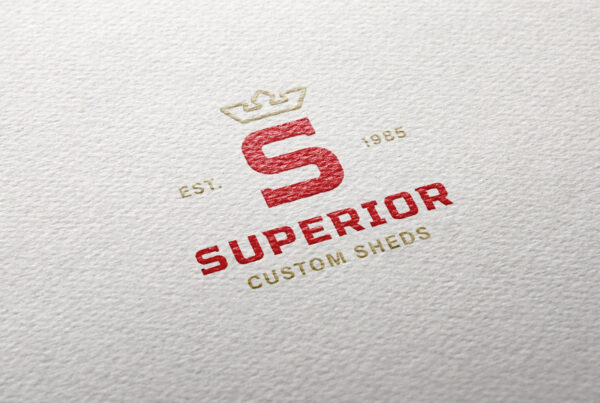 Superior Barns logo design embossed on paper